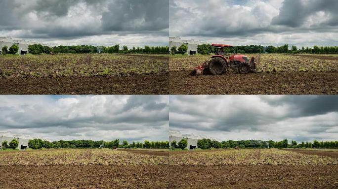时间流逝: 拖拉机在田间农业上的整地。