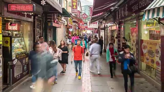 中国澳门氹仔美食街的延时行人