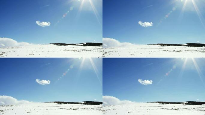 阳光明媚，下雪，部分阴天的科罗拉多州米克尔附近的景观