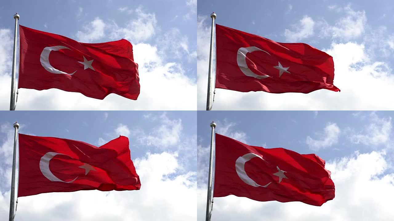 土耳其国旗在蓝天下随风飘扬