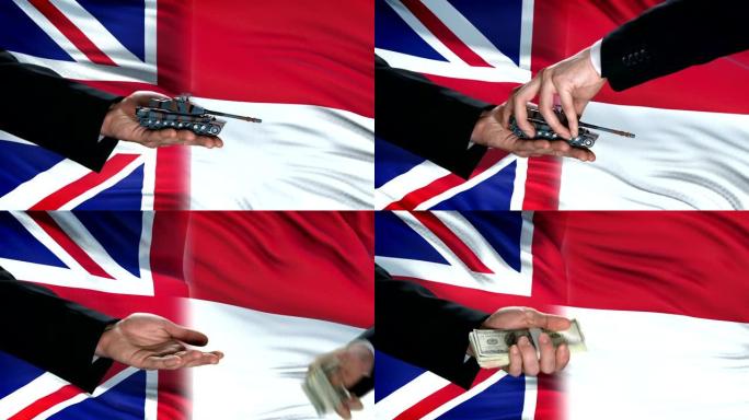 英国和印度尼西亚官员用坦克换钱，国旗背景