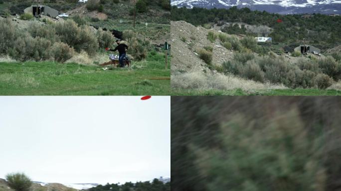 三十多岁的高加索人使用正手驱动器在圆盘高尔夫球场 (飞盘高尔夫) 的草地，多山的风景中长距离投掷圆盘