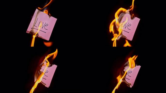 SLO MO LD粉红色的纸上刻有 “爱” 字样的纸着火了