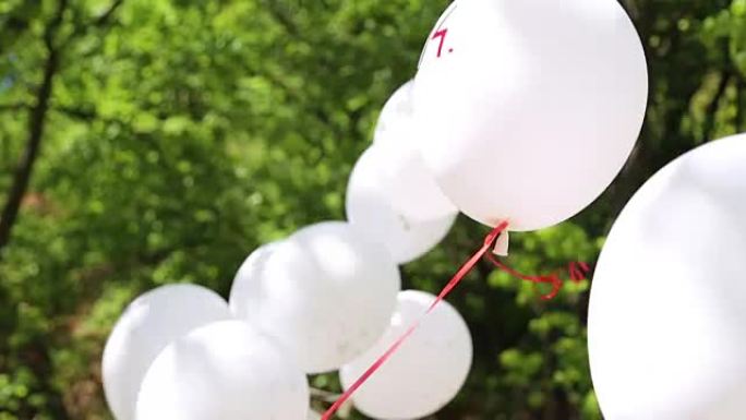 婚礼气球白色气球空镜头一串气球