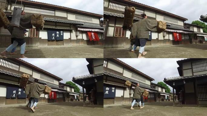 走在乡村街道上的日本男子