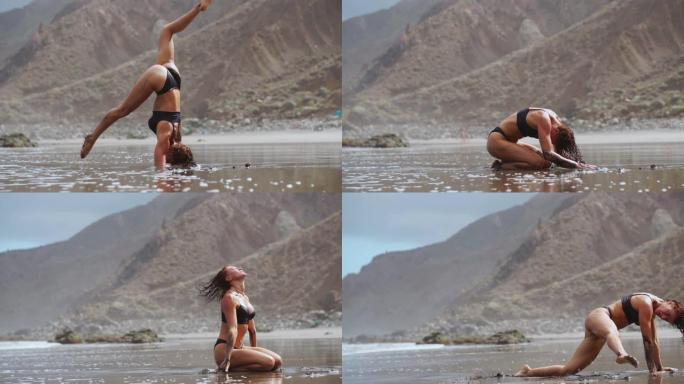 女孩在海边的沙滩上做瑜伽站在平衡器上站在他的手上，保持休息和和谐