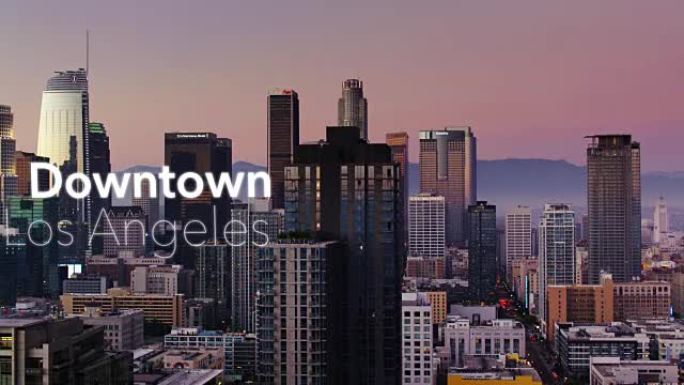DTLA在日落时的无人机拍摄，并带有浮动文字: “洛杉矶市中心”