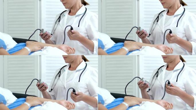 医院护士测量孕妇卧床血压，保健