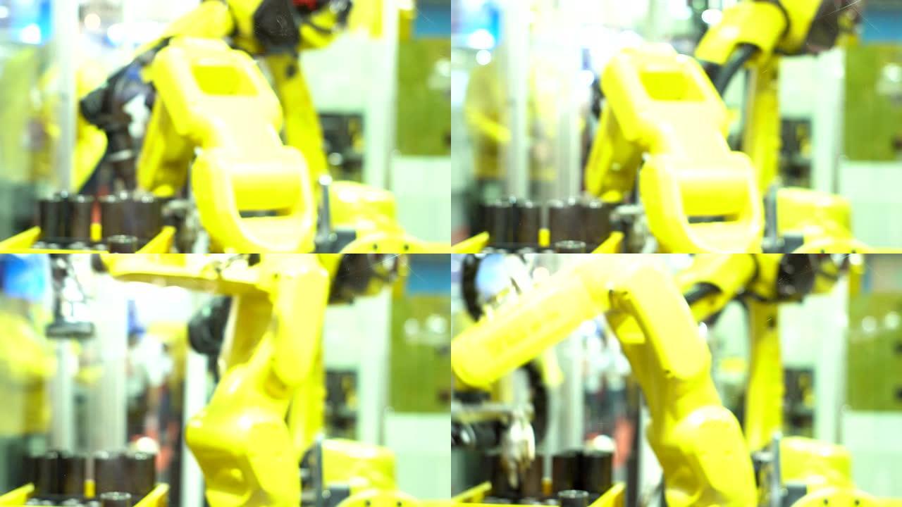 在工厂操作的工业机器人。