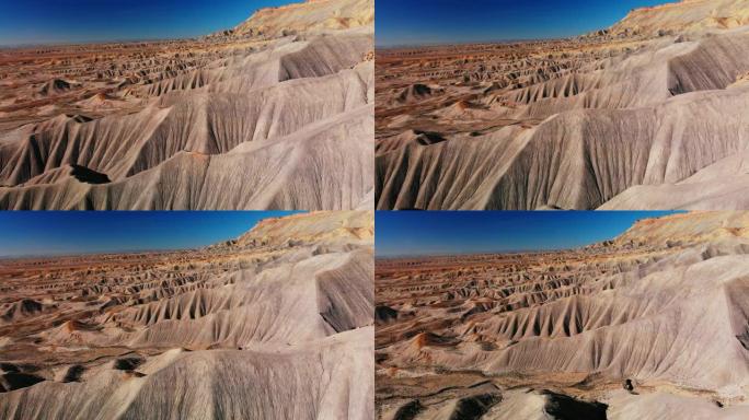 空中无人机拍摄了Bookcliffs (地质构造) 和山的条纹，侵蚀的砂岩悬崖。加菲猫在科罗拉多州大