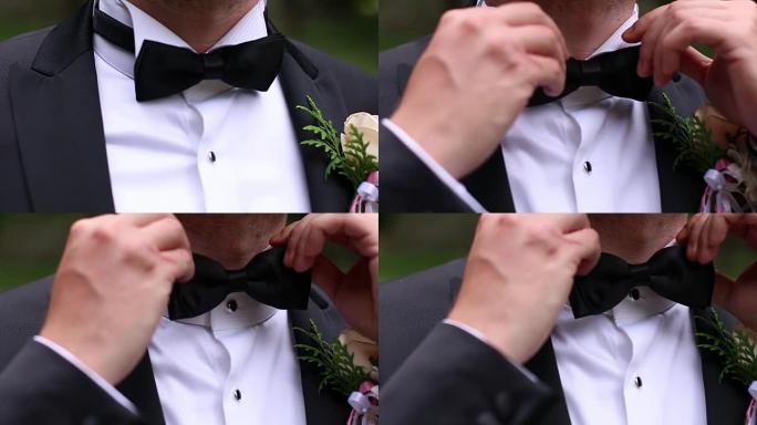 男人的手碰到领结婚庆题材精致装扮特殊时刻
