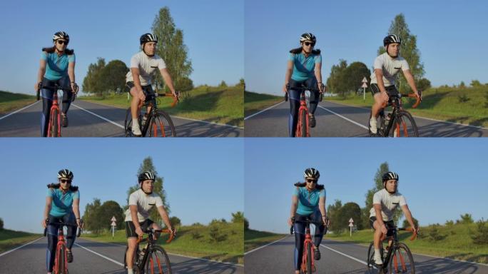 在乡间小路上追踪一群骑自行车的人的照片。完全发布用于商业用途