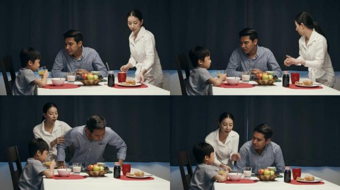 亚洲父亲在晚餐时间责骂儿子