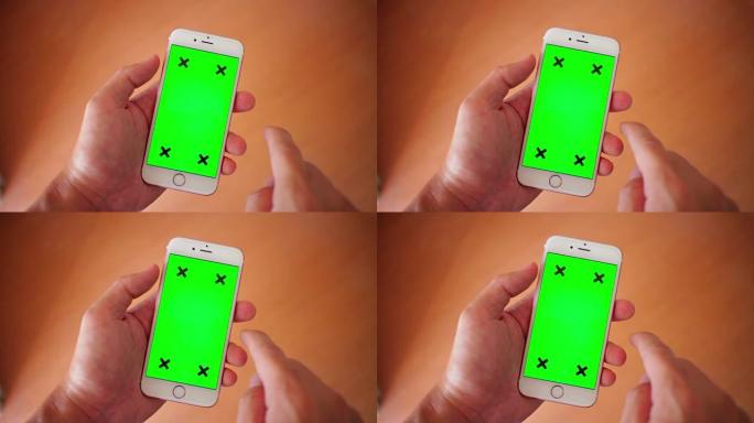 使用智能手机，绿屏，特写