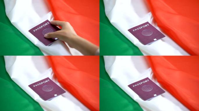 女性手放国际红色护照意大利国旗，欧洲移民