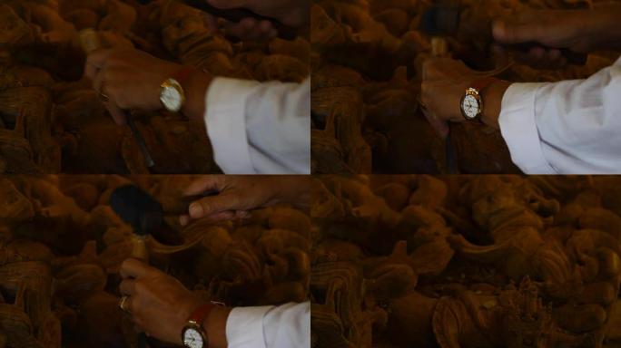 木匠手工使用凿子工具木制制作泰国艺术风格的木工艺。