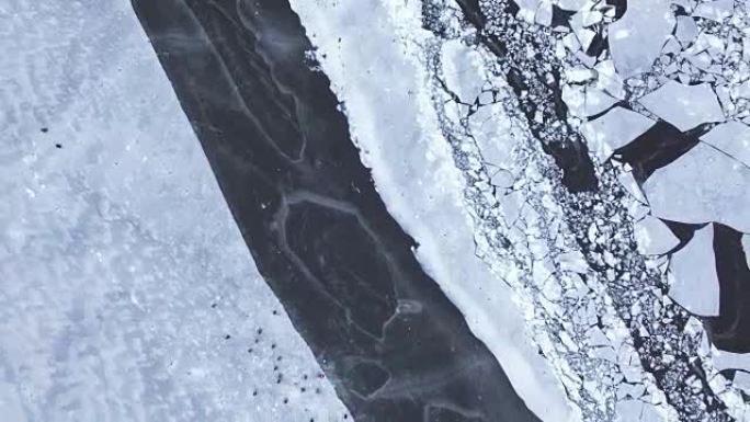 冰冻的河流和冰上捕鱼-鸟瞰图