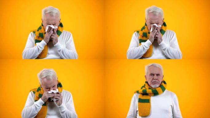 老年男性在围巾吹鼻子组织，大黄或鼻炎，流感症状