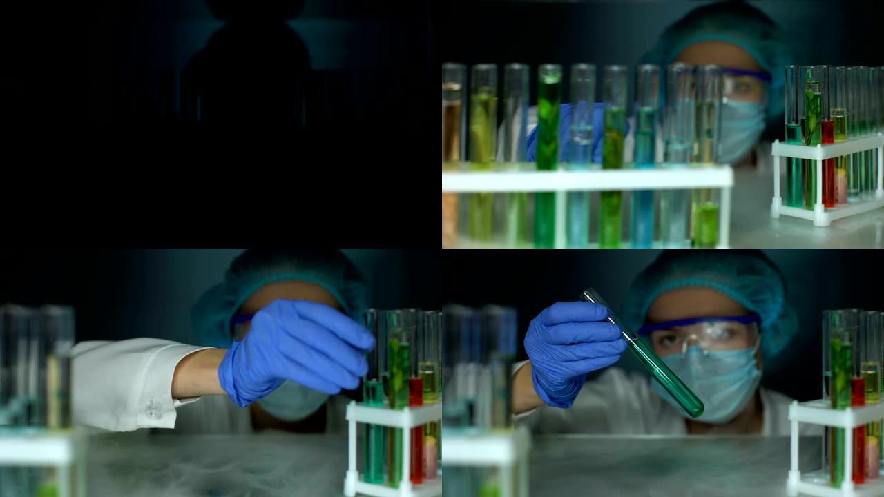 研究人员打开冰箱并分析管中蓝色透明液体