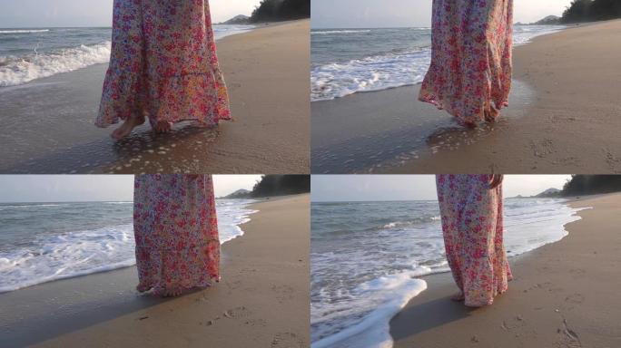 高清慢动作: 美丽的女人走在沙滩上