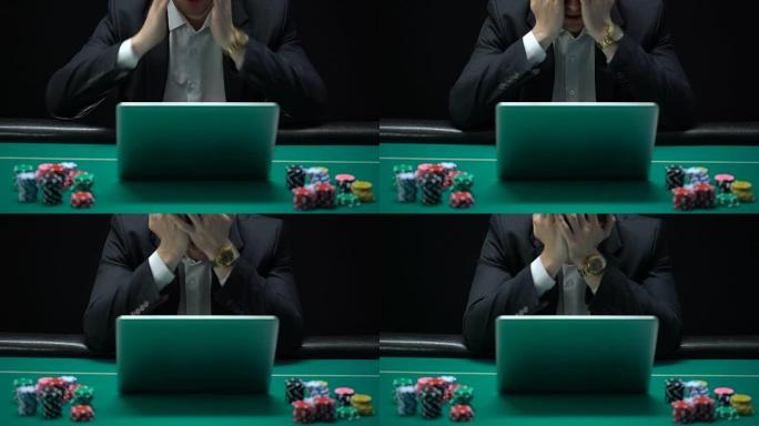 赌博上瘾的商人在笔记本电脑前，输掉体育赌注，破产