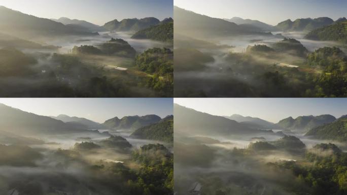 随着日出，山谷中的雾过度消失