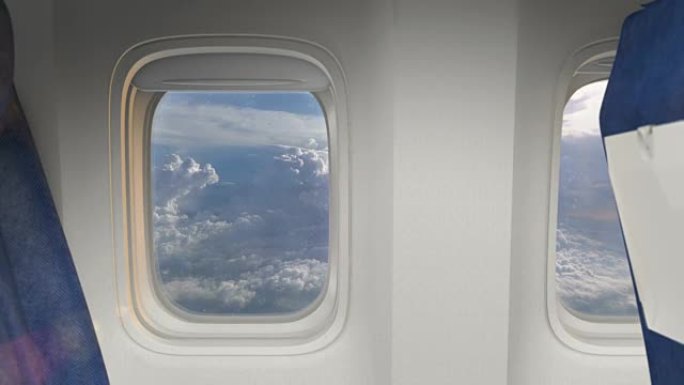 飞机窗飞机内饰坐飞机拍摄飞云之上