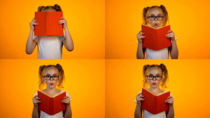 惊讶的书呆子女孩戴着眼镜躲在书后面，有趣的故事，天才
