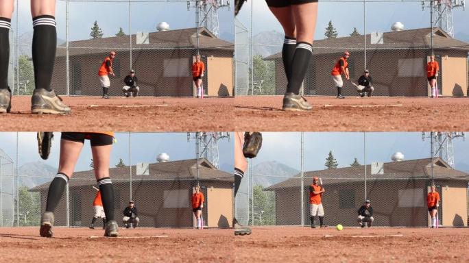 朋友在指定的棒球场打垒球