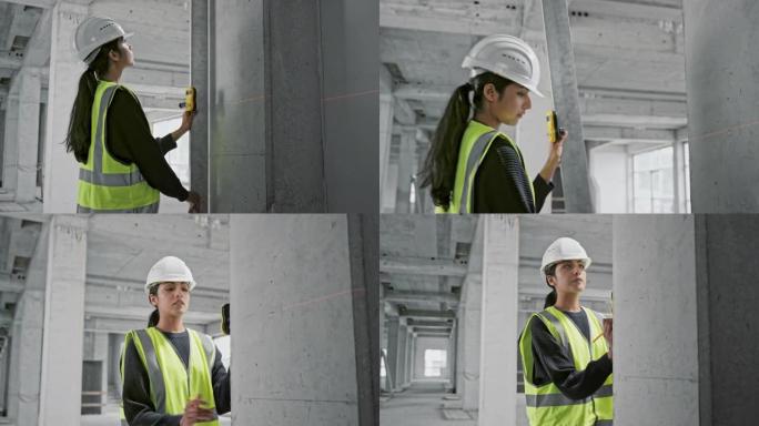 女建筑师测量工业建筑中的支撑梁并对其进行标记