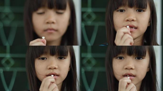 亚洲小女孩失去了乳牙