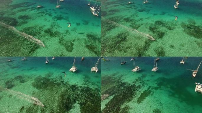 联合岛加勒比海平坦水面上的风筝冲浪者的航拍
