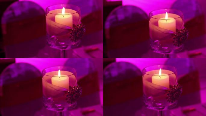 桌子上漂亮的蜡烛燃烧蜡烛点燃火焰火苗