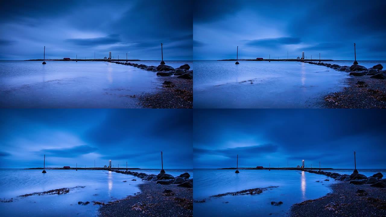 冰岛灯塔在黄昏时闪烁-时间流逝