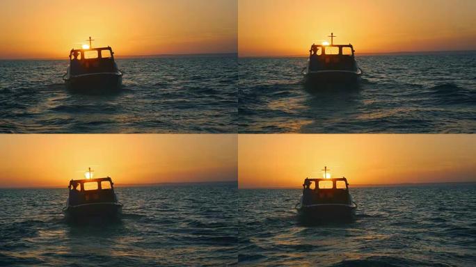 SLO MO船在海上骑行到日落