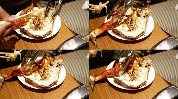 桌子上的龙虾烤架海鲜产品吃饭实拍