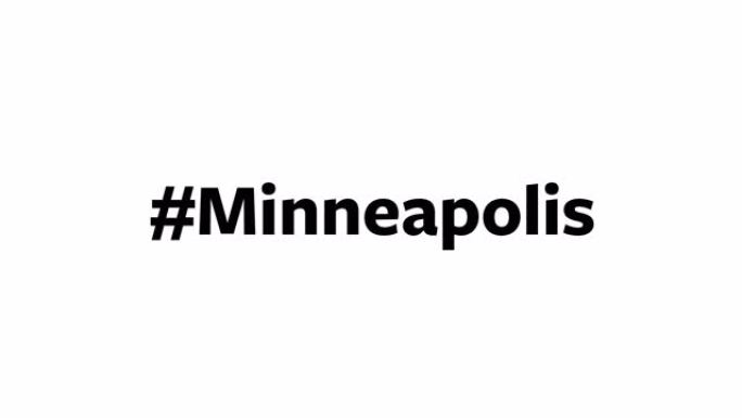 一个人在他们的电脑屏幕上输入 “# Minneapolis”