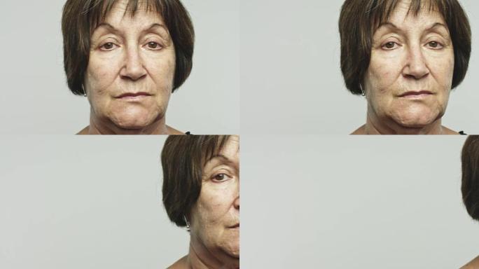 多莉 (Dolly) 看着相机拍摄的成熟女性肖像