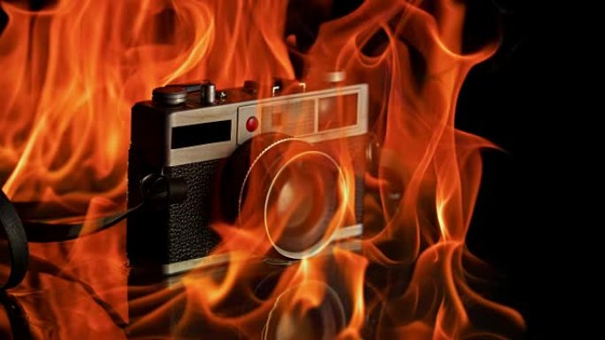 SLO MO相机在黑色表面和背景上处于火焰中
