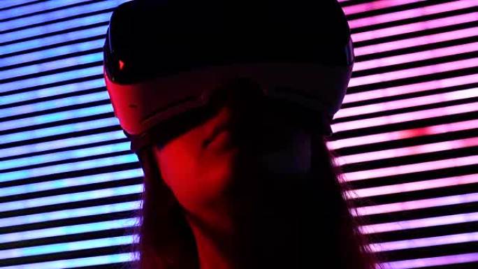 女人在夜间城市灯光、模拟环境、游戏中戴着虚拟现实耳机