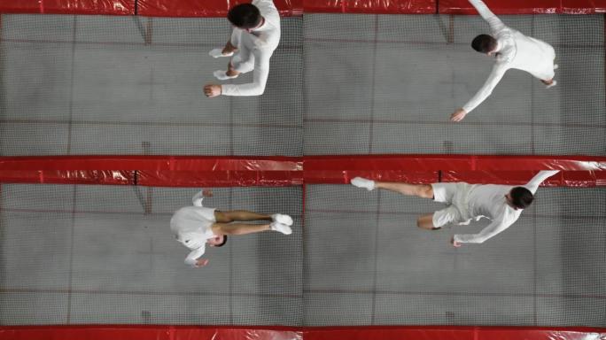 一个穿着白色衣服的男人跳上蹦床顶视图
