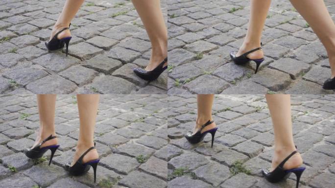 穿着时髦鞋子的女性腿走在街上。