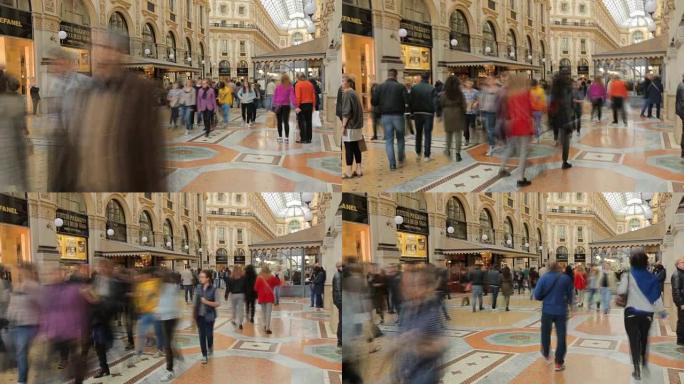 人们走在意大利米兰市著名的维托里奥·埃马努埃莱购物画廊附近的大教堂广场上。