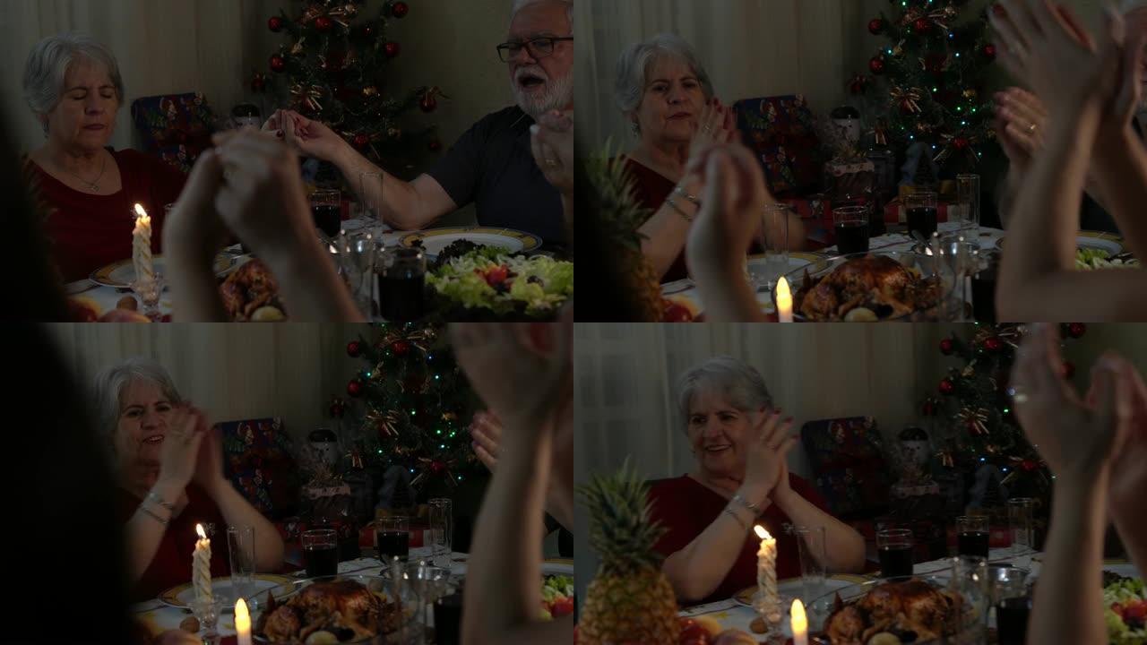 家人一起吃饭前祈祷 -- 圣诞节