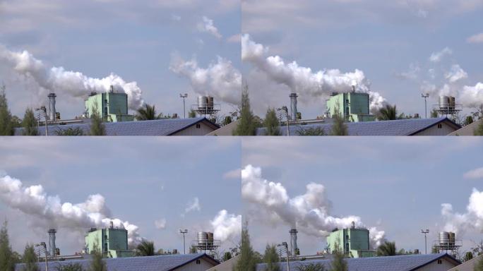工业工厂正在燃烧烟囱的污染烟雾，工业和污染概念