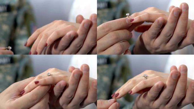 士兵给女性戴上戒指，向女友求婚，夫妇结婚