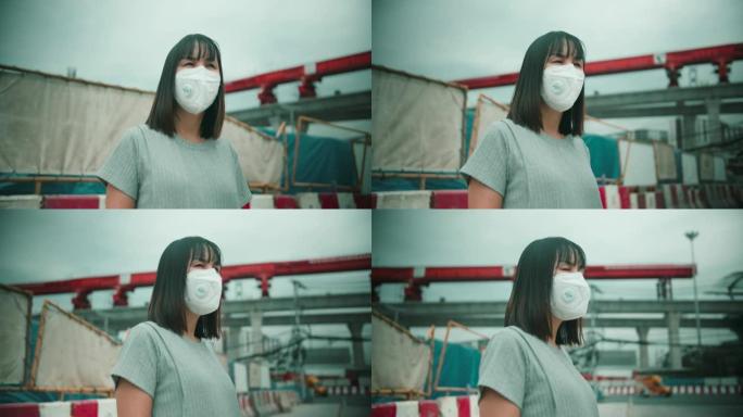 有面罩保护的女人免受空气污染