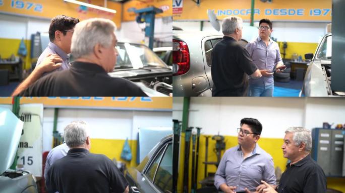 高级机械师向客户展示汽车修理厂