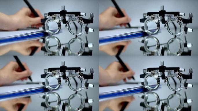 医生写眼镜处方，用光学试验架检查视力