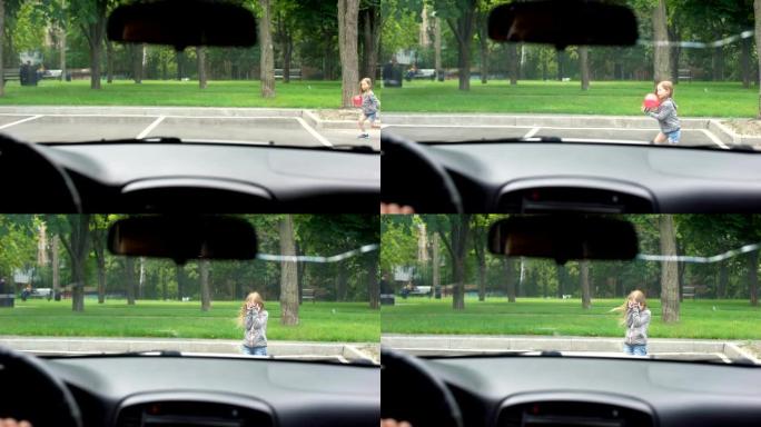 小女孩在停车场玩球，汽车司机急刹车，冒险